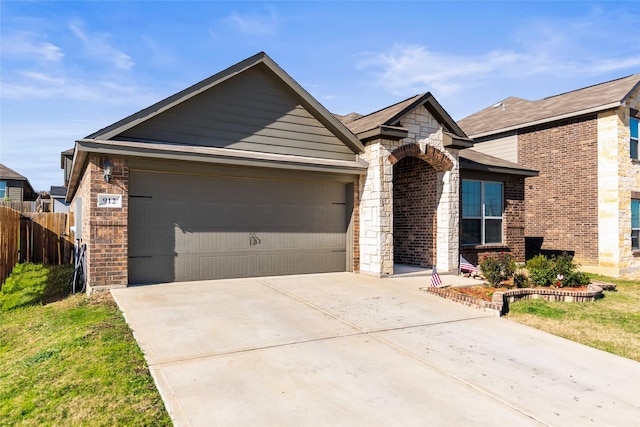 single story home featuring a garage