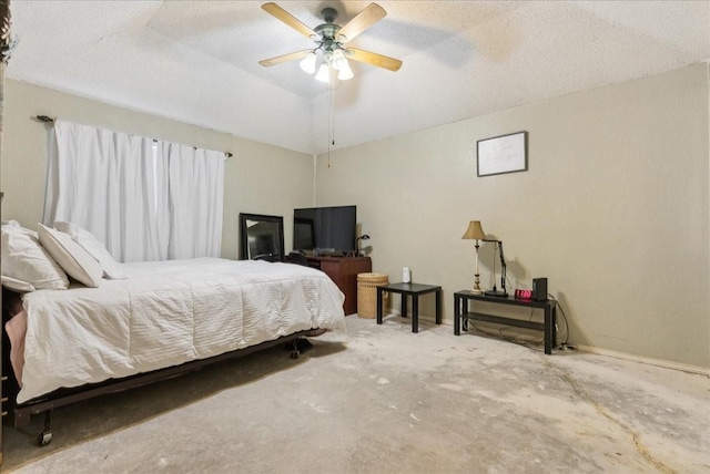 bedroom featuring ceiling fan and lofted ceiling