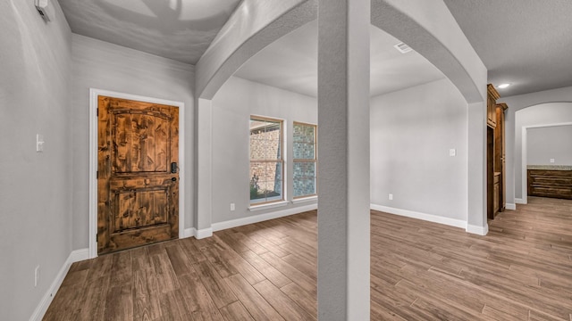 entrance foyer with wood-type flooring