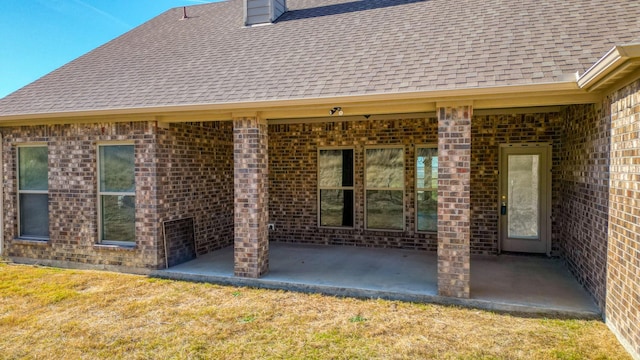 back of property with a patio area