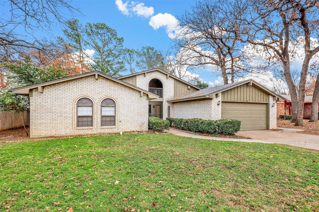 view of front facade featuring a front lawn and a garage