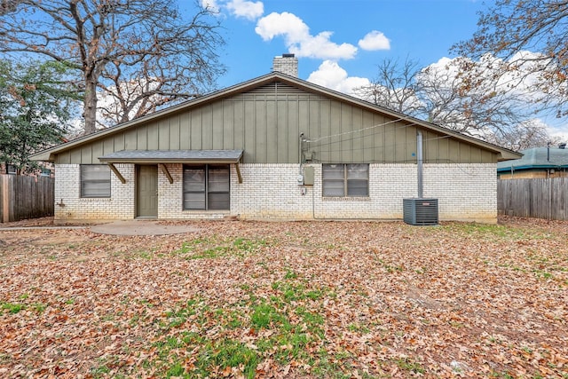 rear view of property featuring a patio area