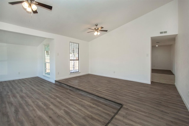 unfurnished living room featuring ceiling fan, lofted ceiling, and dark wood-type flooring