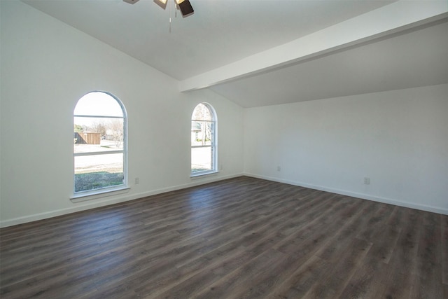 spare room featuring dark hardwood / wood-style flooring, lofted ceiling with beams, and ceiling fan