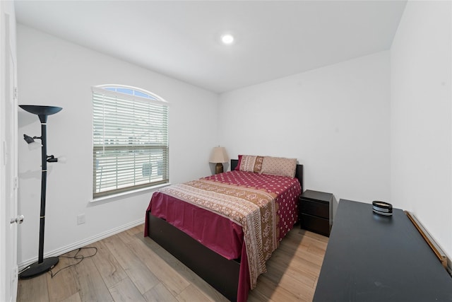 bedroom featuring light hardwood / wood-style floors