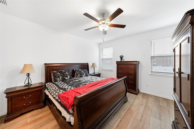 bedroom featuring light hardwood / wood-style flooring and ceiling fan