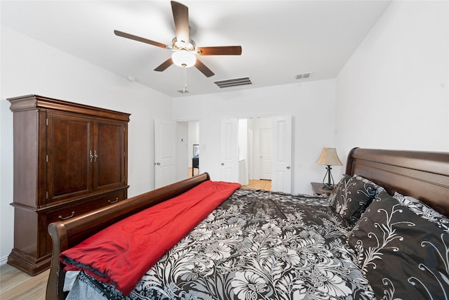 bedroom featuring ceiling fan and light wood-type flooring