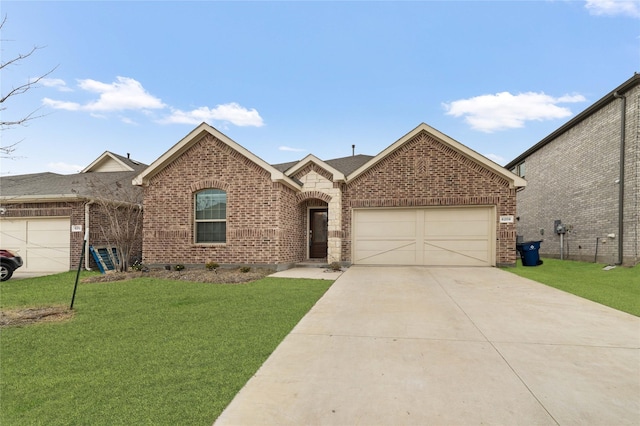 view of front of house featuring a garage and a front yard