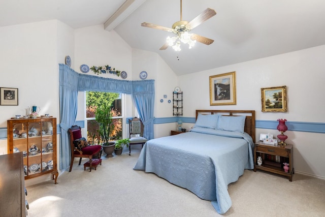 bedroom featuring light carpet, beam ceiling, high vaulted ceiling, and ceiling fan