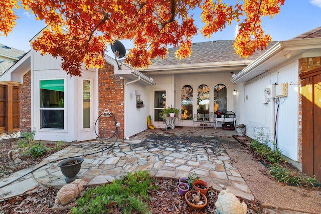 back of property with a patio area