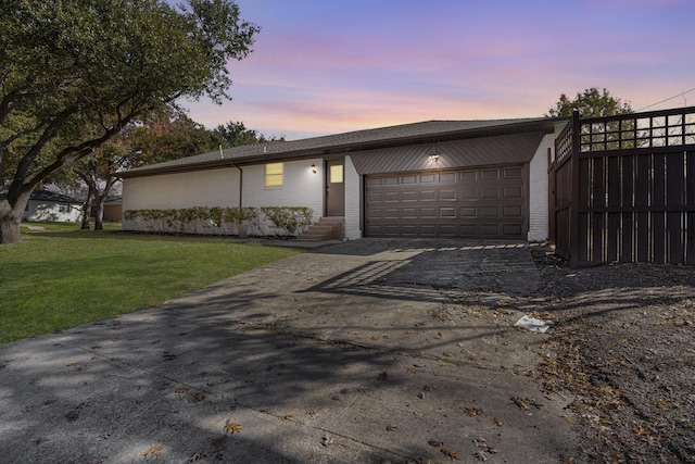 view of front of house with a yard