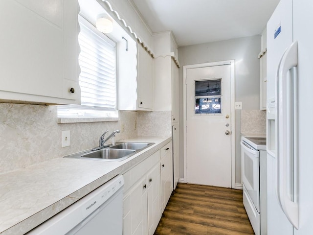 kitchen featuring sink, white cabinets, white appliances, decorative backsplash, and dark hardwood / wood-style flooring