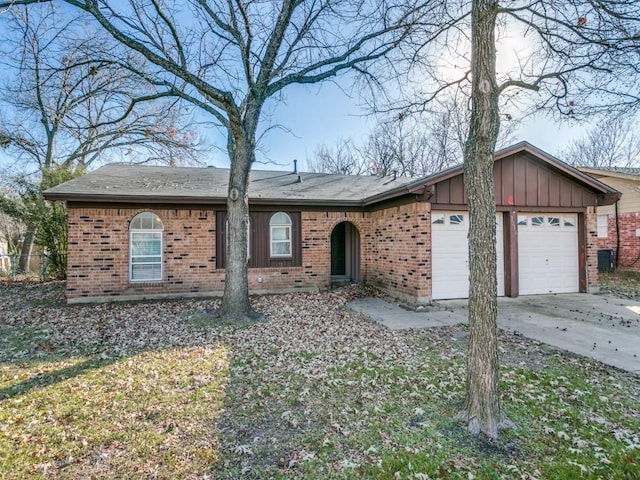 ranch-style house featuring a garage