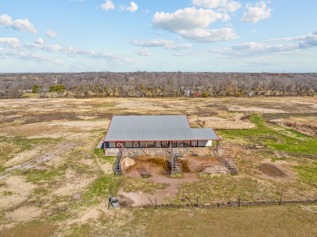 birds eye view of property featuring a rural view