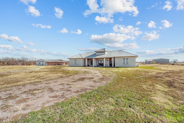 ranch-style house with a front lawn