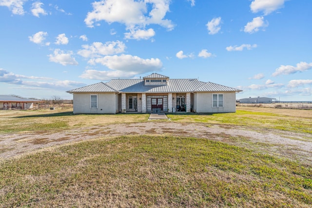 single story home with a front lawn