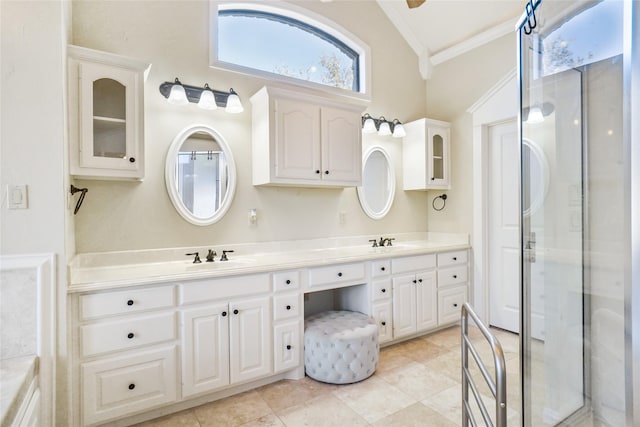 bathroom featuring vanity, vaulted ceiling, an enclosed shower, and crown molding