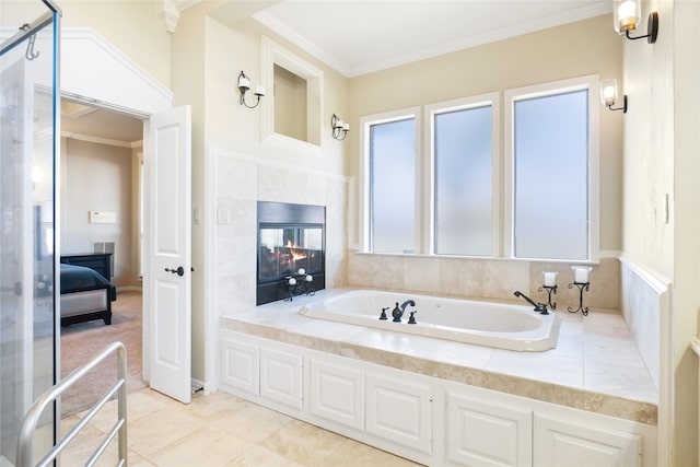 bathroom featuring tile patterned flooring, a tub to relax in, and crown molding