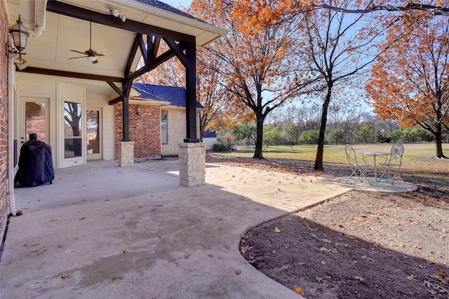 view of patio / terrace featuring ceiling fan