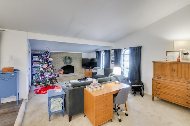 living room featuring a fireplace and vaulted ceiling