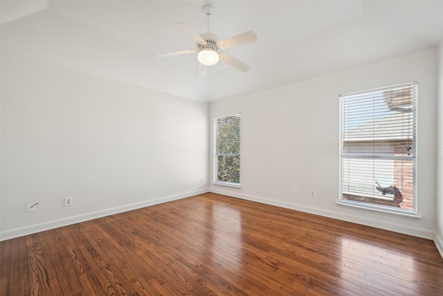 empty room with wood-type flooring and ceiling fan