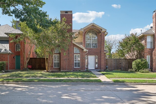 view of front property featuring a front yard