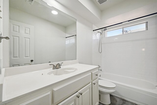 full bathroom featuring tile patterned floors, shower / bathing tub combination, vanity, and toilet