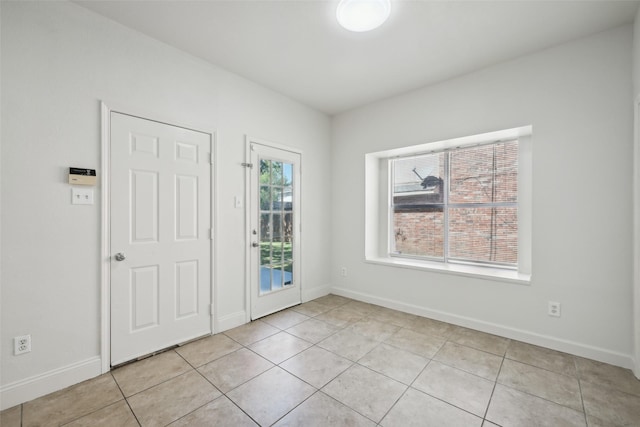 interior space featuring light tile patterned floors