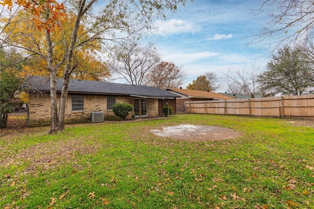 view of yard featuring a patio and cooling unit