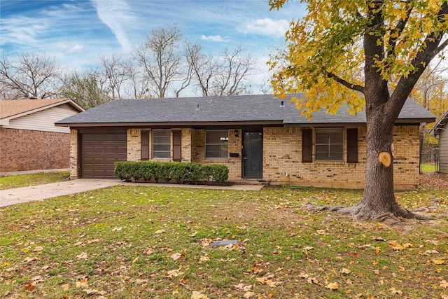 single story home featuring a front yard and a garage