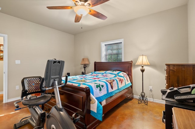 bedroom featuring ceiling fan and concrete flooring