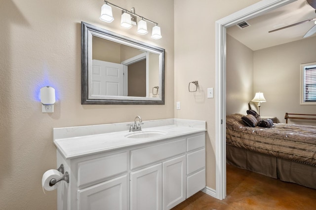 bathroom featuring vanity and ceiling fan