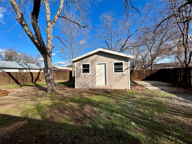 view of outdoor structure with a yard