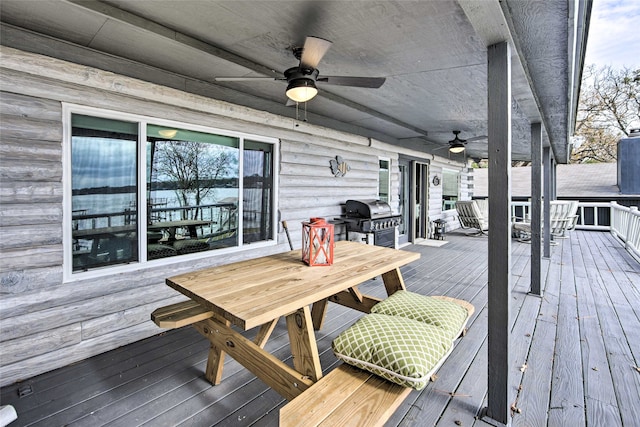 deck with area for grilling and ceiling fan