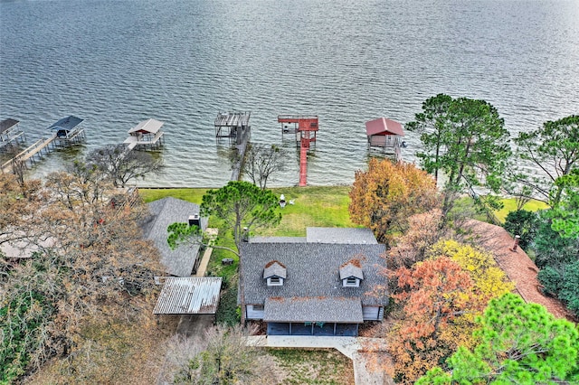 drone / aerial view with a water view