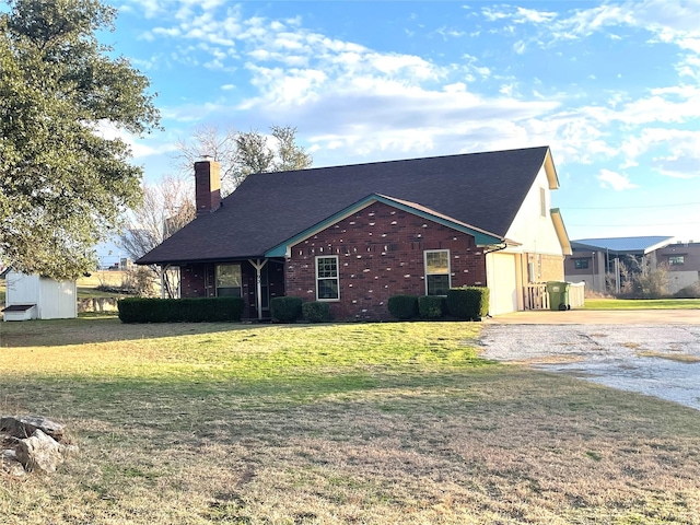 view of front of home with a front yard