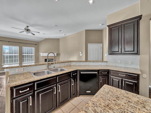 kitchen featuring dishwasher, dark brown cabinets, ceiling fan, and sink