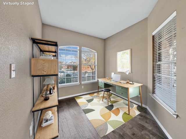 home office featuring dark wood-type flooring