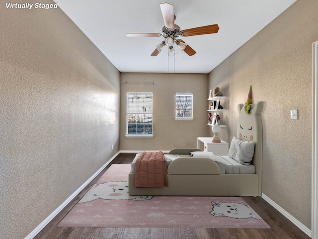 unfurnished room with hardwood / wood-style flooring and ceiling fan