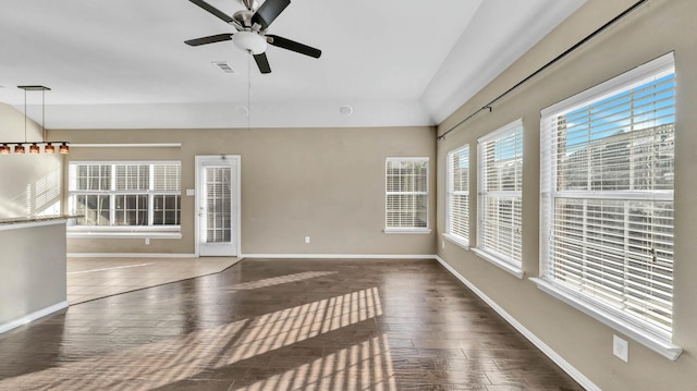 interior space featuring dark hardwood / wood-style flooring and ceiling fan