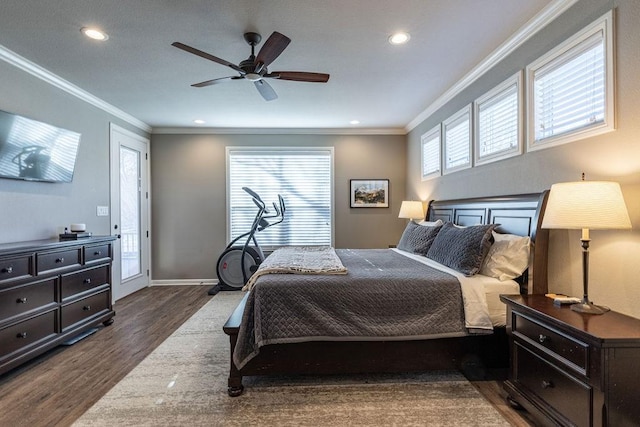 bedroom featuring crown molding, ceiling fan, and dark wood-type flooring