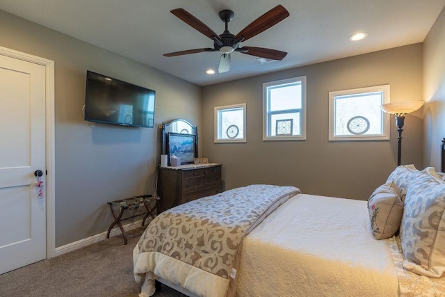 carpeted bedroom featuring ceiling fan