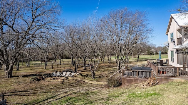 view of yard with a wooden deck