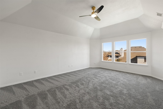 interior space featuring ceiling fan and lofted ceiling