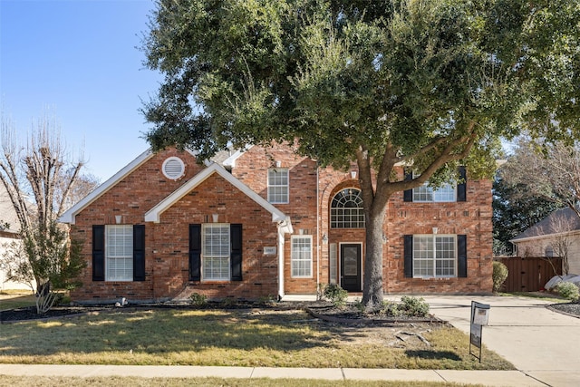 view of front of home with a front yard