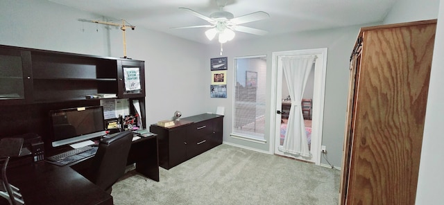 office area featuring ceiling fan and light carpet