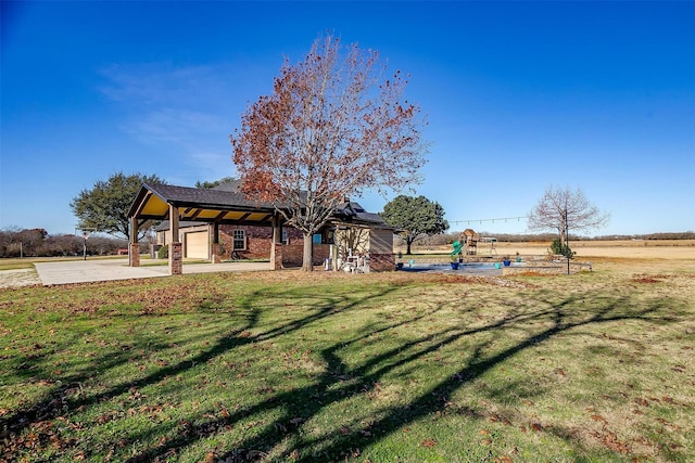 view of playground featuring a yard