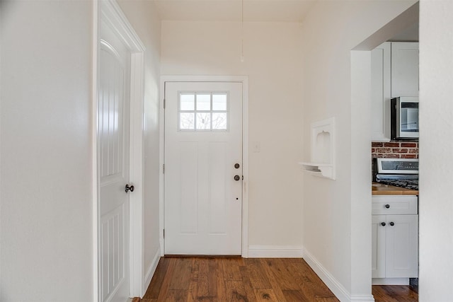 doorway featuring wood-type flooring