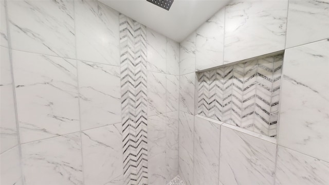 details featuring a tile shower