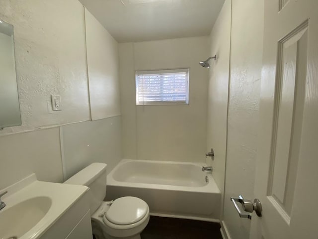 full bathroom featuring vanity, toilet, and washtub / shower combination